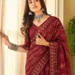 Regal Maroon Floral Print Saree with Intricate Zari-Inspired Borders